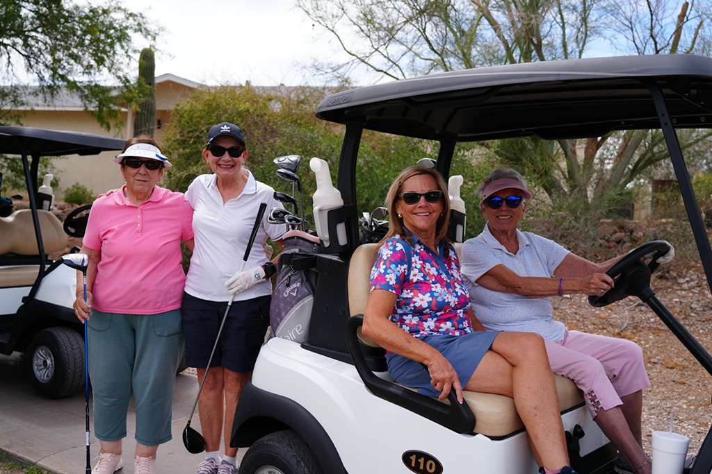 Golf cart with attendants