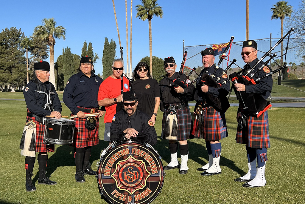 Scottish performers on golf course